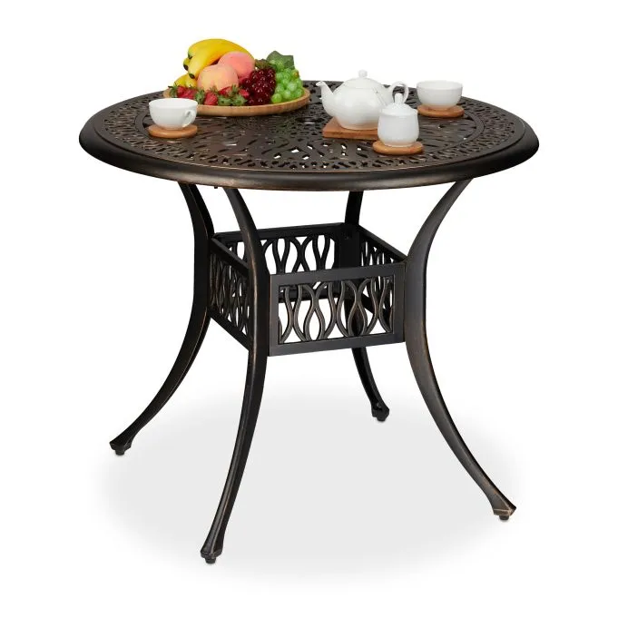 Antieke tuintafel met parasolgat